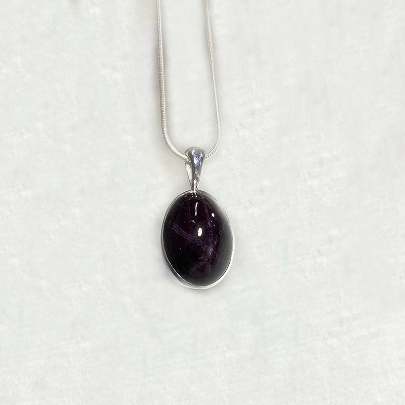Oval Star Garnet Pendant