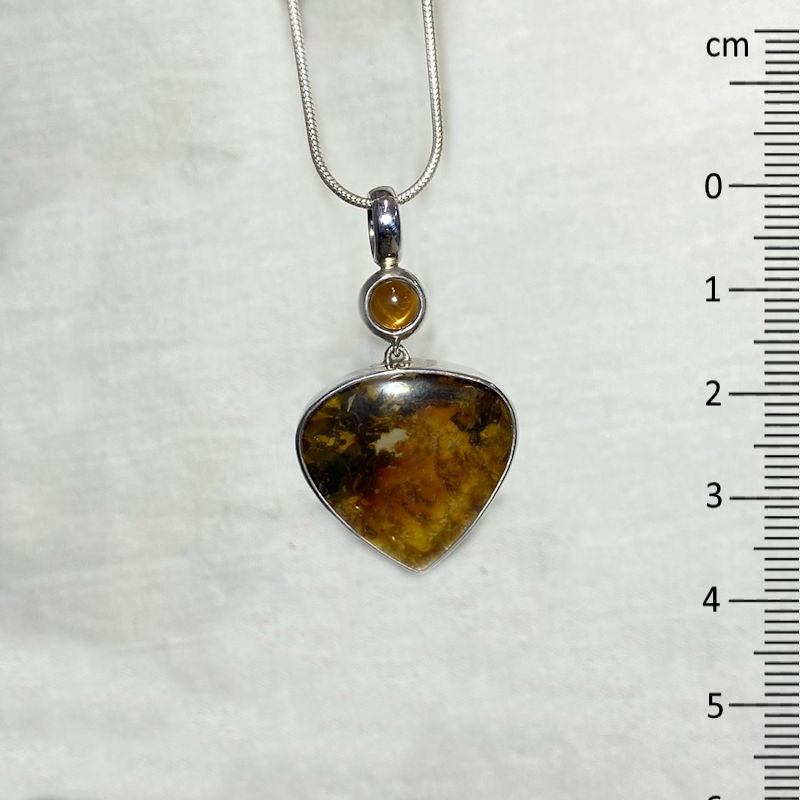 Combination Round Sunstone & Dendrite In Quartz Pendant