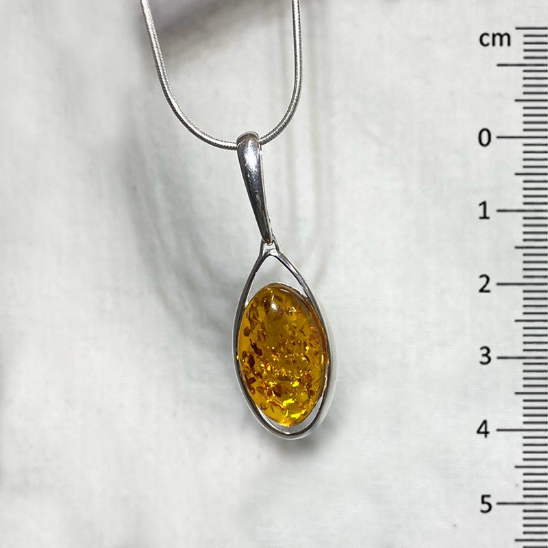 Ornate Sterling Silver Oval Amber Pendant
