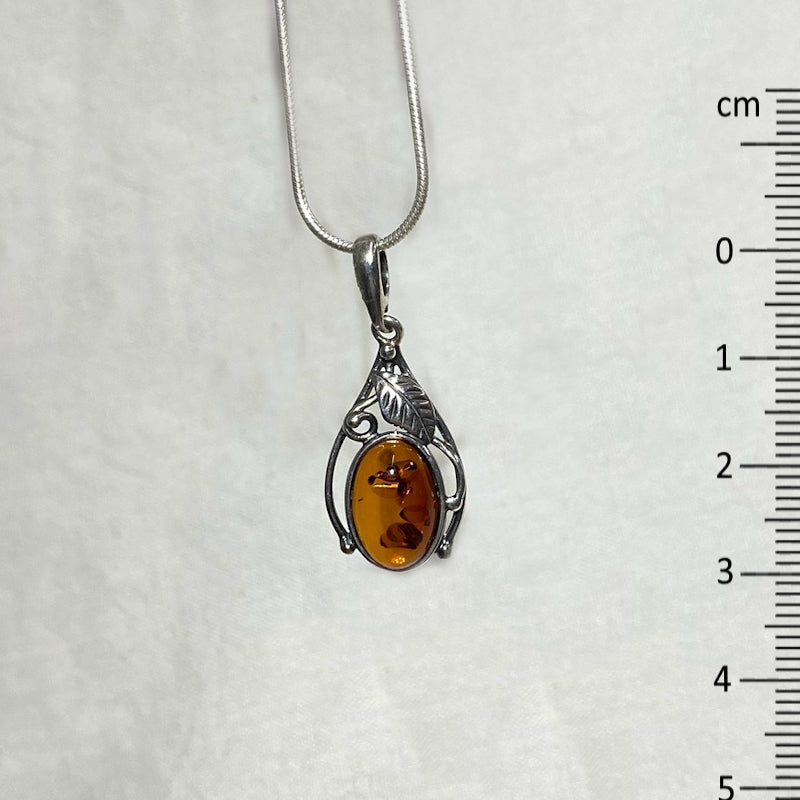 Oval Amber Ornate Sterling Silver Pendant