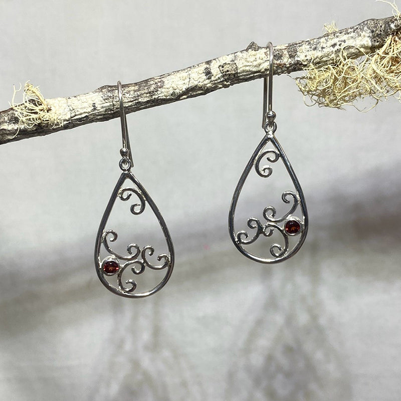 Swirling Sterling Silver Round Faceted Garnet Earrings