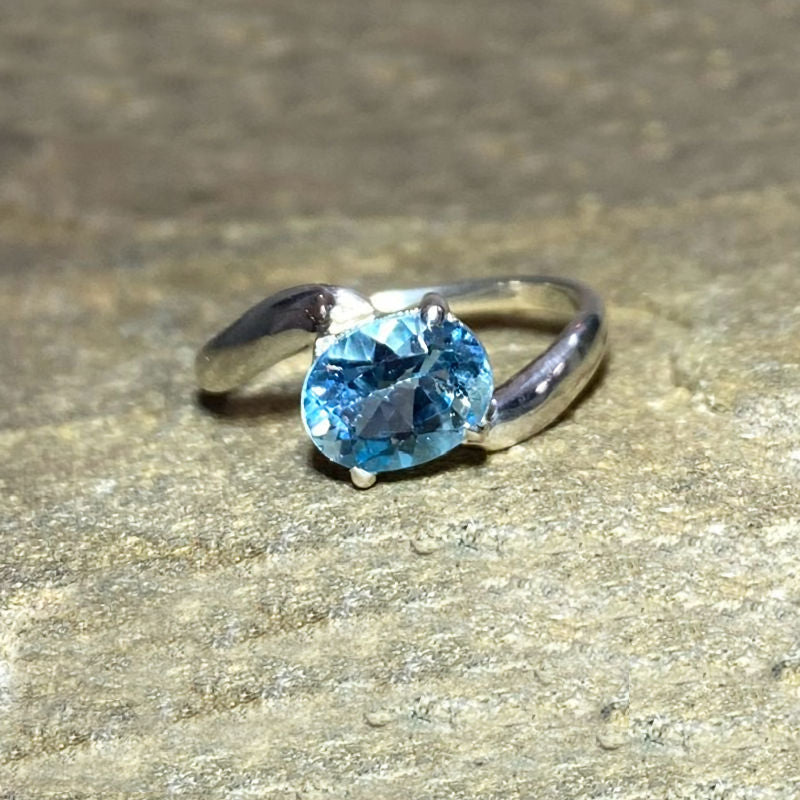Faceted Oval Blue Topaz Offset Sterling Silver Ring- Size 9