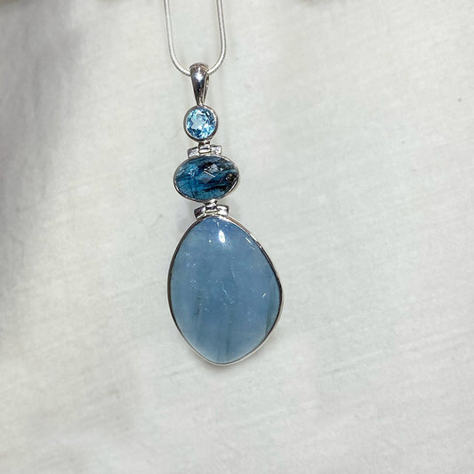 Combination Round Faceted Blue Topaz, Oval Faceted Ocean Kyanite & Freeform Aquamarine Pendant