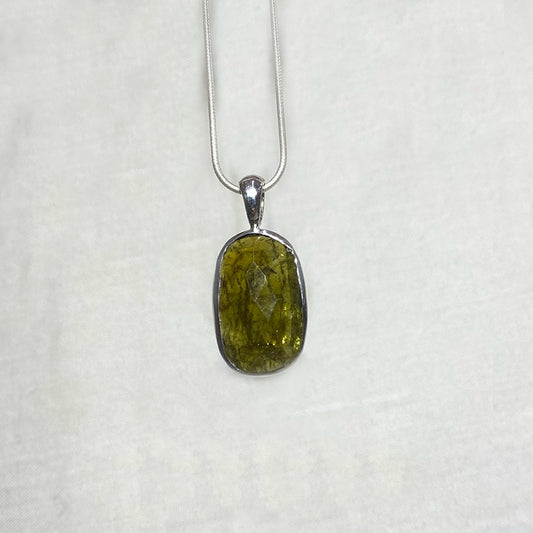 Faceted Oval Grossular Garnet Pendant