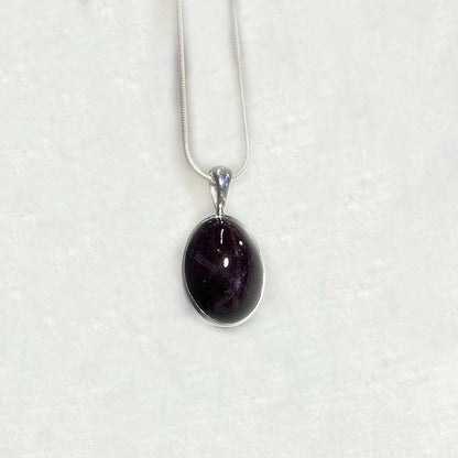Oval Star Garnet Pendant