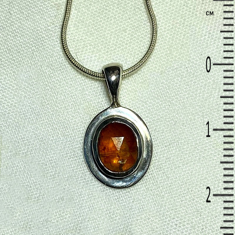 Oval Faceted Orange Kyanite Pendant