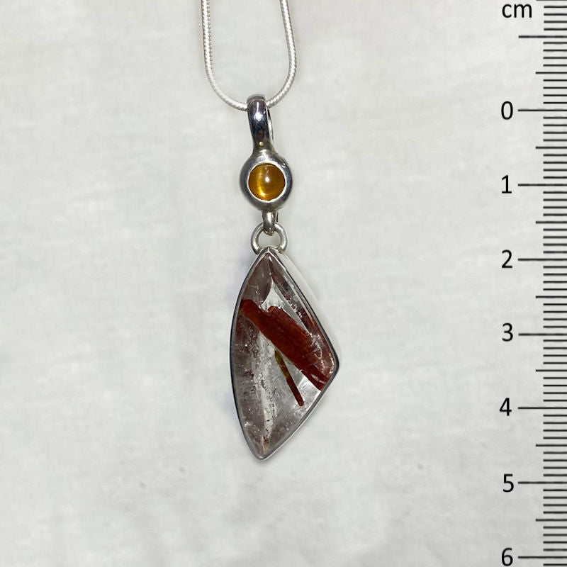 Round Sunstone & Epidote In Quartz Pendant