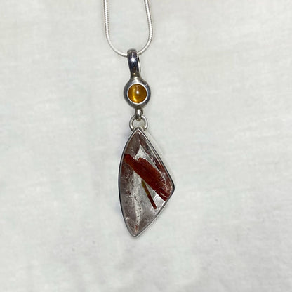 Round Sunstone & Epidote In Quartz Pendant