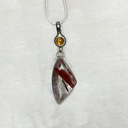 Round Sunstone & Epidote In Quartz Pendant