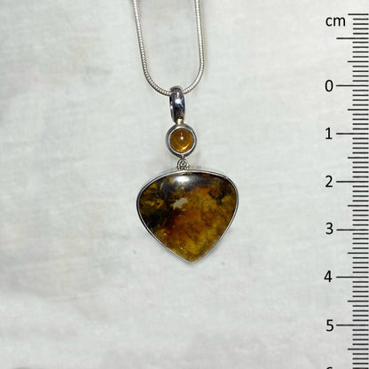 Combination Round Sunstone & Dendrite In Quartz Pendant