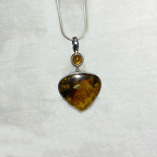 Combination Round Sunstone & Dendrite In Quartz Pendant