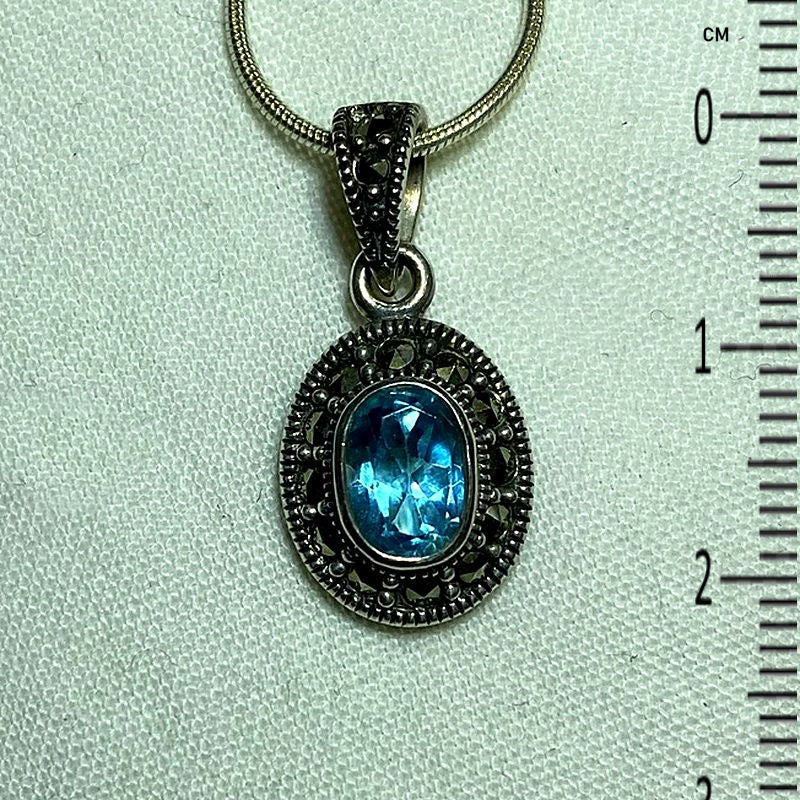 Faceted Oval Blue Topaz & Marcasite Pendant