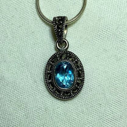 Faceted Oval Blue Topaz & Marcasite Pendant