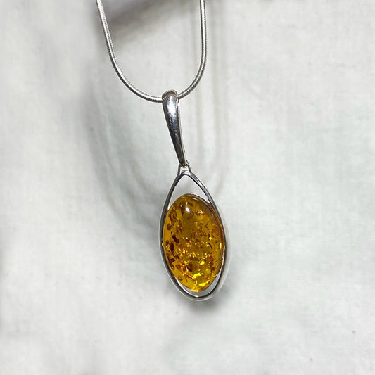 Ornate Sterling Silver Oval Amber Pendant