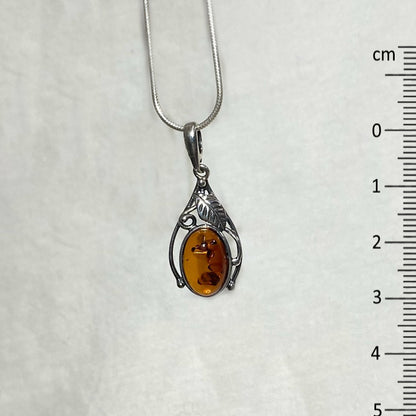 Oval Amber Ornate Sterling Silver Pendant
