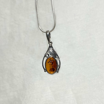 Oval Amber Ornate Sterling Silver Pendant