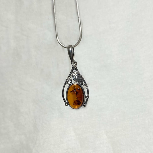 Oval Amber Ornate Sterling Silver Pendant
